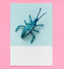 Sticker - Colorful miniature bug on a paper