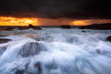 Wall Mural - Beautiful Seascape with sea and rock on sunset background.