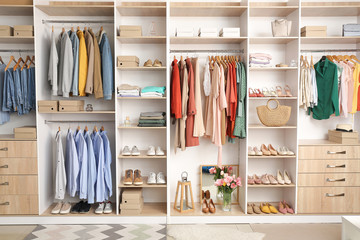Wall Mural - Modern wardrobe with stylish spring clothes and accessories