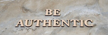 Be Authentic , Writen Wooden Letters On Stone Background