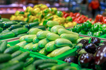 Poster - zucchini in plastic boxes in the store