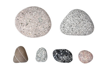 Pebble stones on white background isolated close up top view, set of smooth sea pebbles, rubble collection, different spotted and striped gray, black, brown, pink round cobblestones, group of rocks