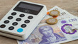 Contactless payment terminal on british currency