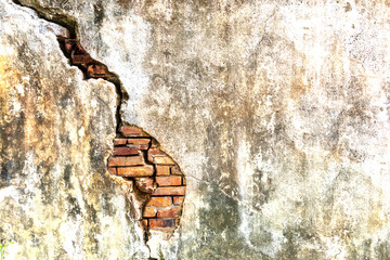 Wall Mural - Old shabby white concrete and brick wall cracks. Cracked white cement wall. Old masonry stone bricks.