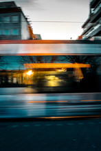 Blurry Motion Of A Tram Train In The City Center. Downtown Of A City, Braunschweig , Germany