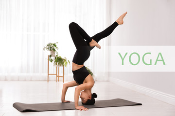 Wall Mural - Young woman in sportswear practicing yoga at home