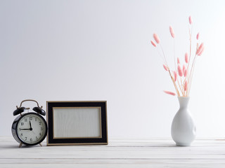 Canvas Print - Frame mock up and black clock.