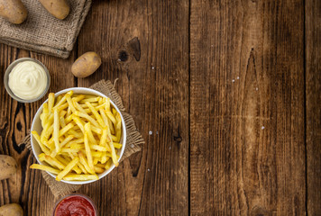 Wall Mural - Crispy French Fries (selective focus; close-up shot)