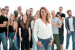 © ASDF - young woman standing in front of a group of diverse young people