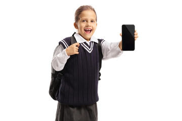 Poster - Happy little scoolgirl holding showing a smartphone