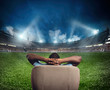 © alphaspirit - Spectator in the armchair at home feels at the center of the event