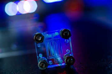 Poster - microfluidic device Instrument that uses micro amounts of fluid on a microchip to do certain laboratory tests.