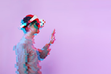 Wall Mural - man is using virtual reality headset. image with glitch effect.