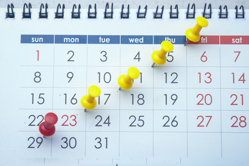 the concept of deadline with push pin on calendar date 