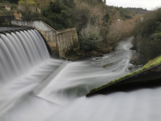 Wall Mural - Long exposure on a waterfall and river