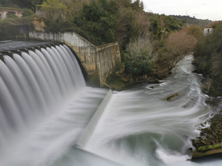 Wall Mural - Long exposure on a waterfall and river