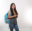 © Kreative Photography - Female Student Wearing Backpack Holds Phone