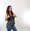 © Kreative Photography - Young Girl Wearing Jeans Gives Two Thumbs Up