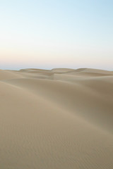 Wall Mural - view of sand dunes against sky