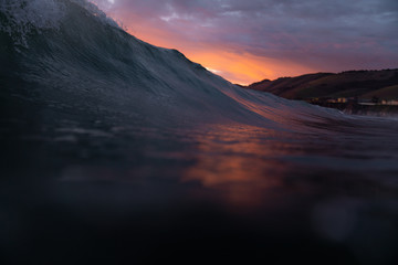 Wall Mural - view of wave in sea during sunset
