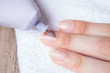 © NataliSam - A woman makes her own hardware manicure at home. Close up. Manicure set. Dangerous. Nails. Home care, salon, Spa, beauty, health. Russian manicure
