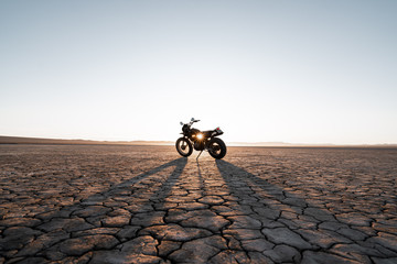Wall Mural - motorcycle parked in death valley during sunset