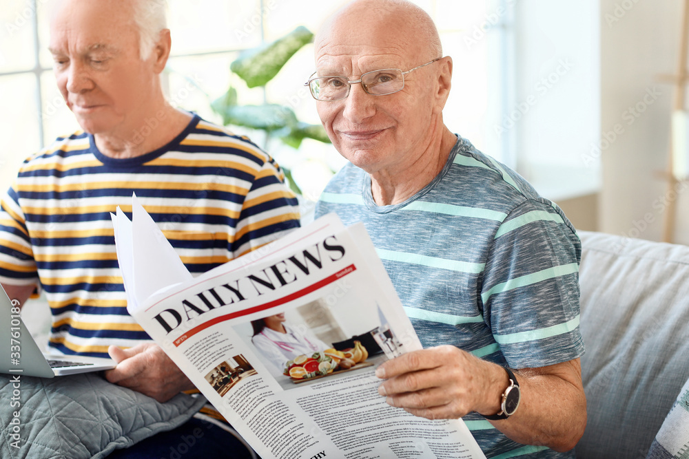 Elderly men resting together at home