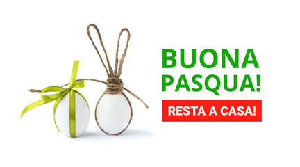 Wall Mural - Easter banner with easter eggs and rabbit ears. Italian language. Happy easter. Stay at home.