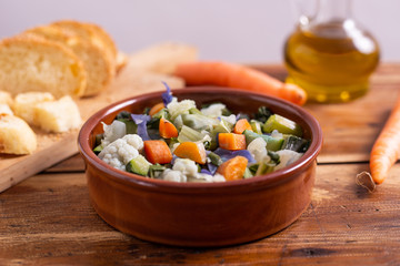 Wall Mural - Mixed fresh vegetables with bread. Minestrone, detox food. 