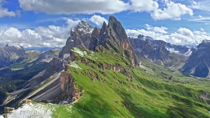 Wall Mural - areal view of seceda with last snow in dolomites