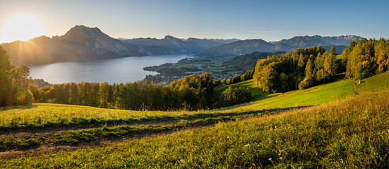 Peaceful autumn Alps mountain lake. Sunrise view to Traunsee lake, Gmundnerberg, Altmunster am Traunsee, Upper Austria.