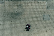 High Angle View Of Man Standing On Street