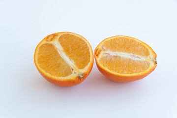 Sliced orange isolated on white background. Close up