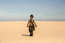 Post Apocalyptic Warrior Boy Outdoors In Desert Wasteland