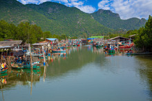 Floating Fishing Village And Fishing Boats In Cat Ba Island, Vietnam, Southeast Asia. UNESCO World Heritage Site.