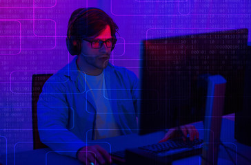 Aufkleber - Programer in headphones at the computer. Dual screen with binary code