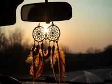 Dream Catcher Hanging In Car At Sunlight Background