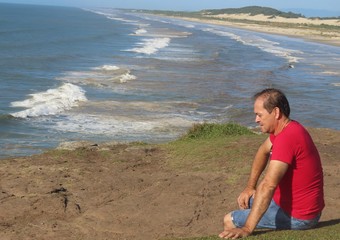 Man sitting on the beach