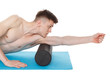 © BY-_-BY - Handsome man shows exercises using a foam roller
