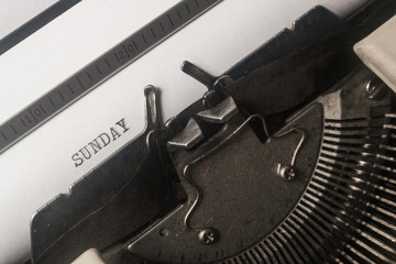 Sunday text written on old typewriter