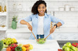 © Prostock-studio - Beautiful young black girl preparing vegetable salad