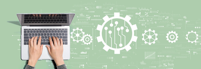 Automation concept with person using a laptop computer