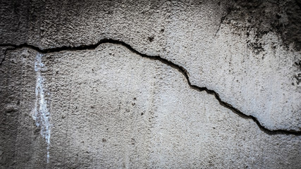 Poster - old stone wall with a crack. texture for design