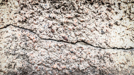 Poster - old stone wall with a crack. texture for design