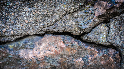 Poster - old stone wall with a crack. texture for design