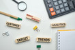 © gesrey - Market research concept - wooden blocks with inscriptions customer, trends, target, analytics.