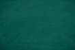 © pattanawit - Green Chalkboard. Chalk texture school board display for background. chalk traces erased with copy space for add text or graphic design. Backdrop of Education concepts