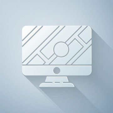 Paper cut Computer monitor and folded map with location marker icon isolated on grey background. Paper art style. Vector Illustration