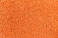Orange Glitter Shiny Texture Background For Christmas, Celebration Concept.