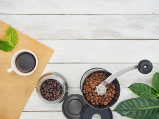 Wall Mural - Coffee grinder with roasted coffee beans.